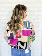Load image into Gallery viewer, Queen Of Sparkles Beige Multi Queen Patchwork Sweatshirt with black and white checkered patches, camel plaid and multi color block letters
