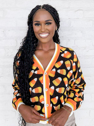 Queen Of Sparkles Black Pearl Candy Corn Cardigan with beaded orange, white and yellow candy corn and striped details on collar and sleeves