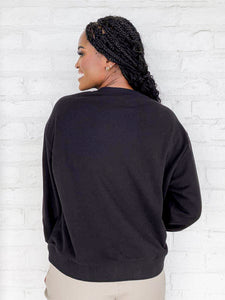 Queen Of Sparkles Black And White Flower Sequin Ghost Sweatshirt with small beaded flowers on an oversized ghost