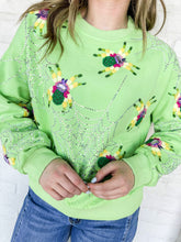Load image into Gallery viewer, Queen Of Sparkles Neon Green Fuzzy Spider Web Sweatshirt with sequin spiders on a silver grey sparkly web
