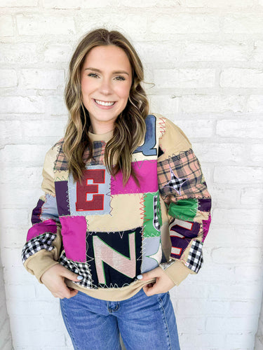 Queen Of Sparkles Beige Multi Queen Patchwork Sweatshirt with black and white checkered patches, camel plaid and multi color block letters