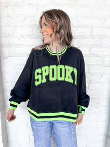  Queen Of Sparkles Black and Neon ‘Spooky’ Sweatshirt with bright green and silver beaded block letters with striped trim