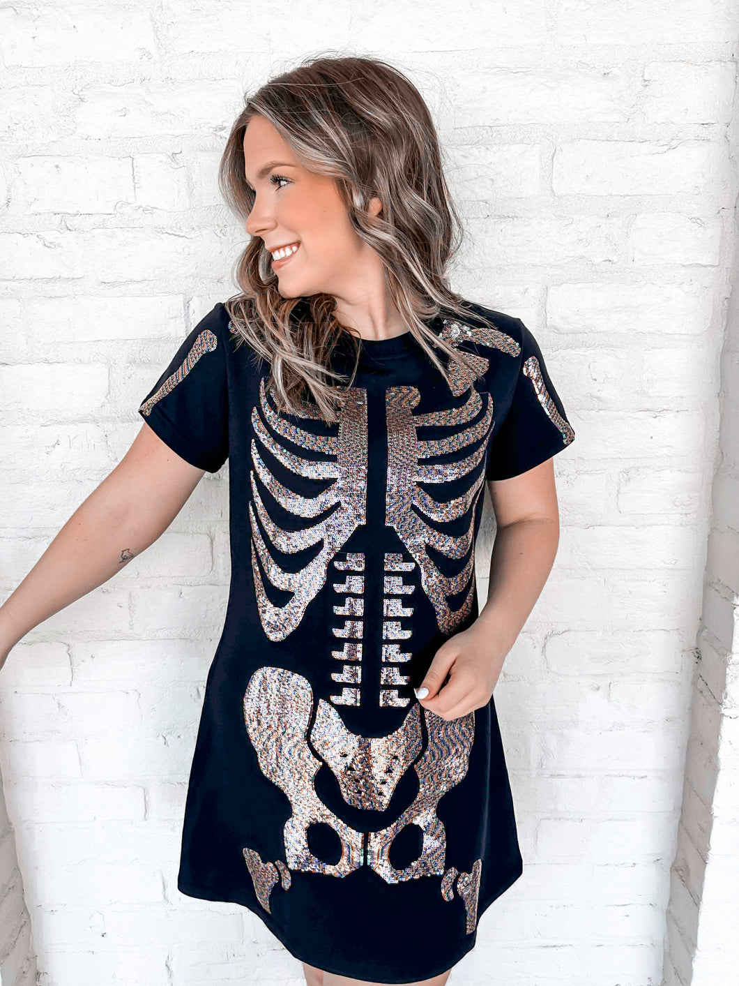 Queen Of Sparkles Black Skeleton Body Tee Dress  featuring a holographic skeleton body design