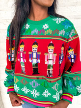 Load image into Gallery viewer, Queen Of Sparkles Green Vintage Nutcracker and Needlepoint Snowflake Sweatshirt