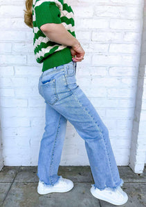 Taking Sides Mid Rise Crop Light Denim Jeans