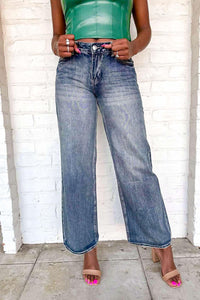 The Moment Low Rise Wide Leg Medium Denim Jean