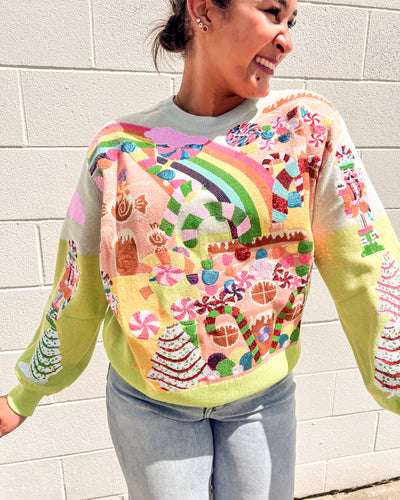Festive Queen of Sparkles Christmas sweater with candy canes and trees