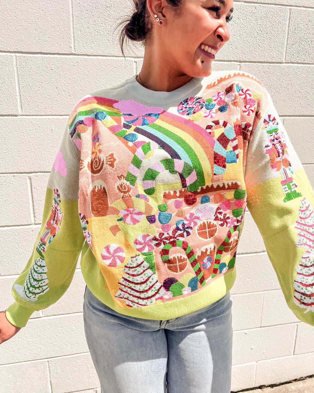 Festive Queen of Sparkles Christmas sweater with candy canes and trees