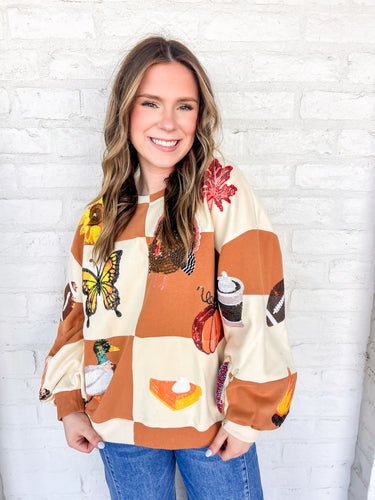 Queen Of Sparkles Checkered Fall Icon Sweatshirt with sequin icons of fall colors, pumpkin pie, butterfly and footballs