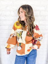 Load image into Gallery viewer, Queen Of Sparkles Checkered Fall Icon Sweatshirt with sequin icons of fall colors, pumpkin pie, butterfly and footballs