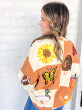 Load image into Gallery viewer, Queen Of Sparkles Checkered Fall Icon Sweatshirt with sequin icons of fall colors, pumpkin pie, butterfly and footballs