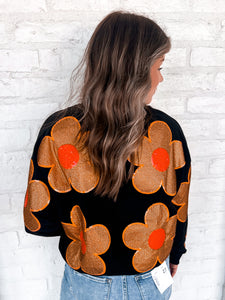 Queen Of Sparkles Orange and Black Oversized Flower Sweatshirt with deep burnt orange and poppy red sequin center flowers