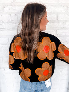 Queen Of Sparkles Orange and Black Oversized Flower Sweatshirt with deep burnt orange and poppy red sequin center flowers