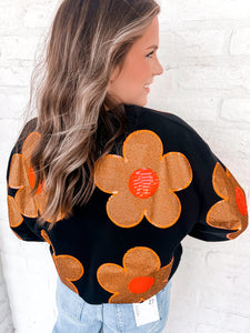 Queen Of Sparkles Orange and Black Oversized Flower Sweatshirt with deep burnt orange and poppy red sequin center flowers
